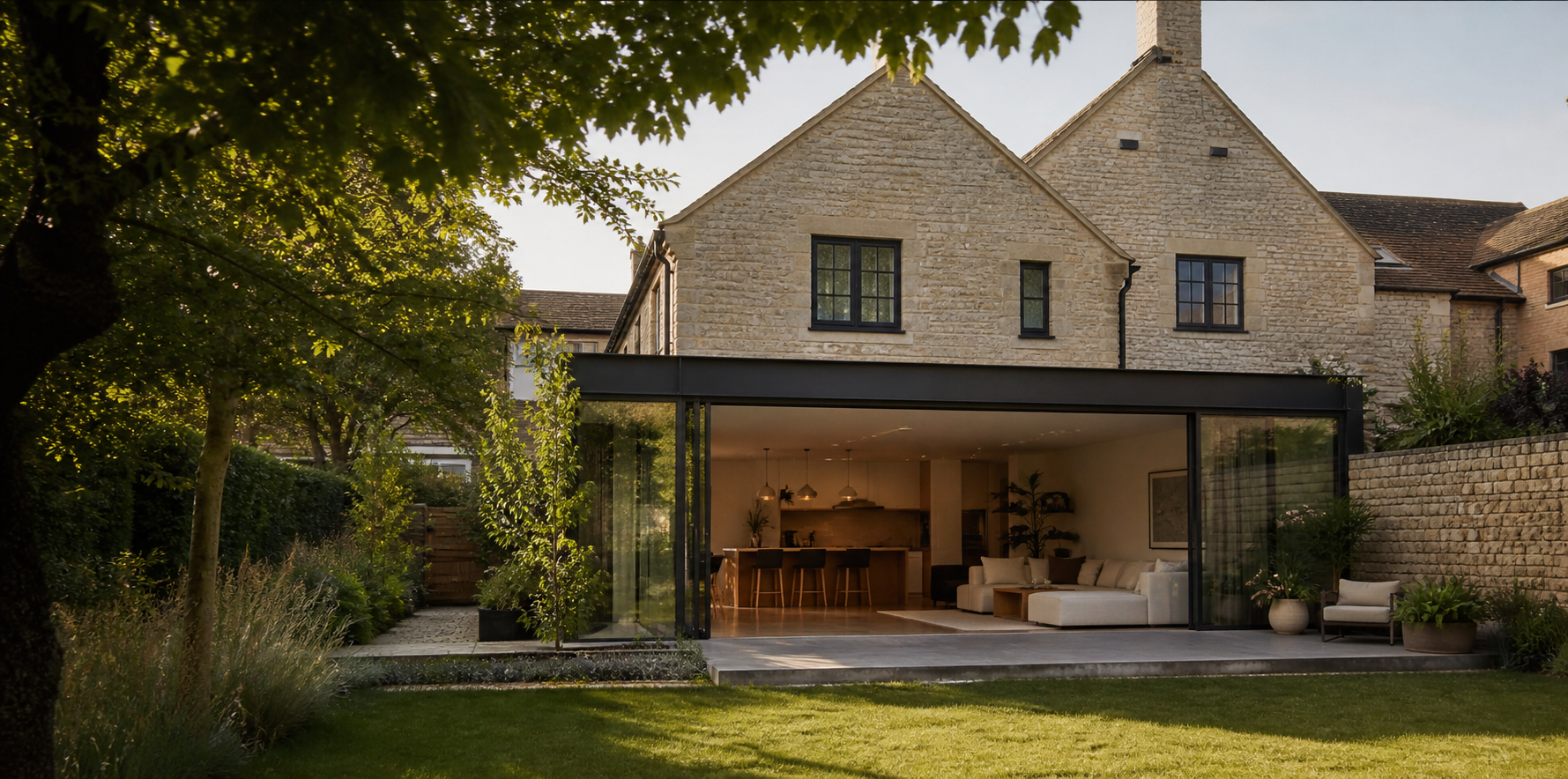 Renovated stone home with a contemporary glazed extension